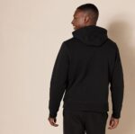 This Men's Drawstring Hoodie combines comfort and style, perfect for everyday wear or athletic activities. Key Features: Front Pocket for convenience Athletic Style with a Crew Neck design Made of Long Sleeve Cotton for durability and comfort This versatile hoodie is suitable for all seasons and occasions, offering a loose-fitting design with a 3/4 length top.